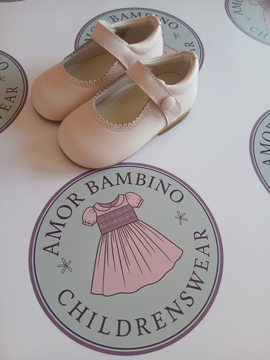 Girls Pink button matte shoes on amor Bambino childrenswear brand logo