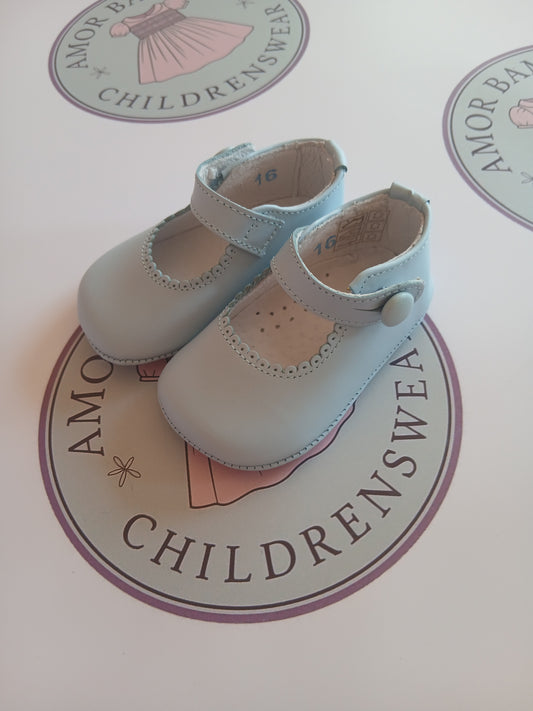 Girls baby blue button mary jane pram shoes on Amor Bambino childrenswear brand logo.